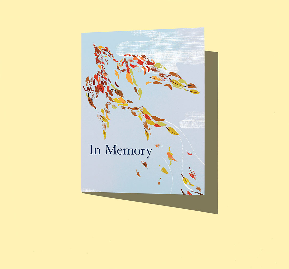 Autumn tree leaves form the shape of a bird in flight