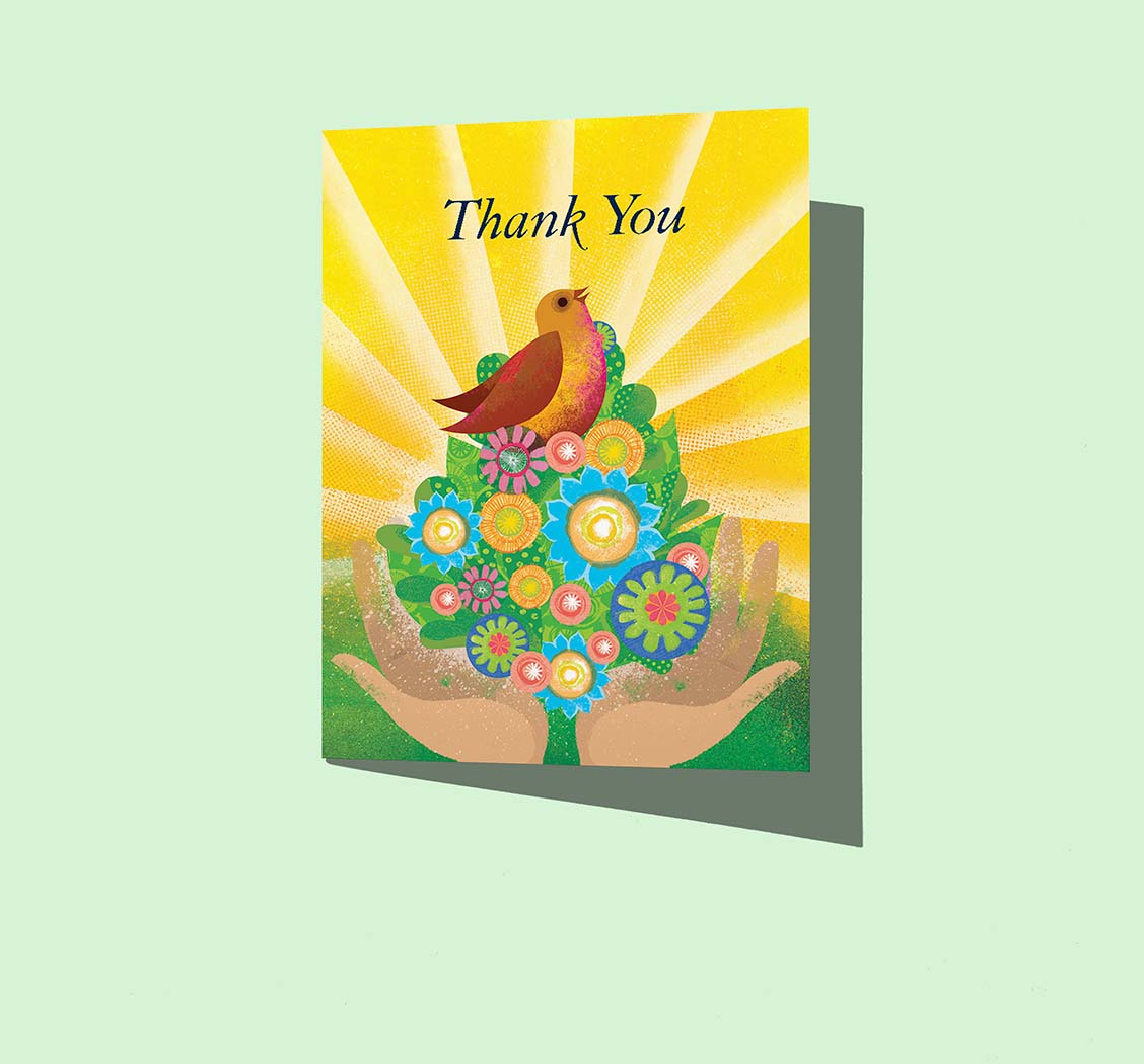 Open hands hold a stylized tree with graphic flowers and a bird atop singing